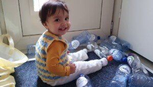 Emily 'Tidying' Up The Bottles Emily 'Tidying' Up The Bottles